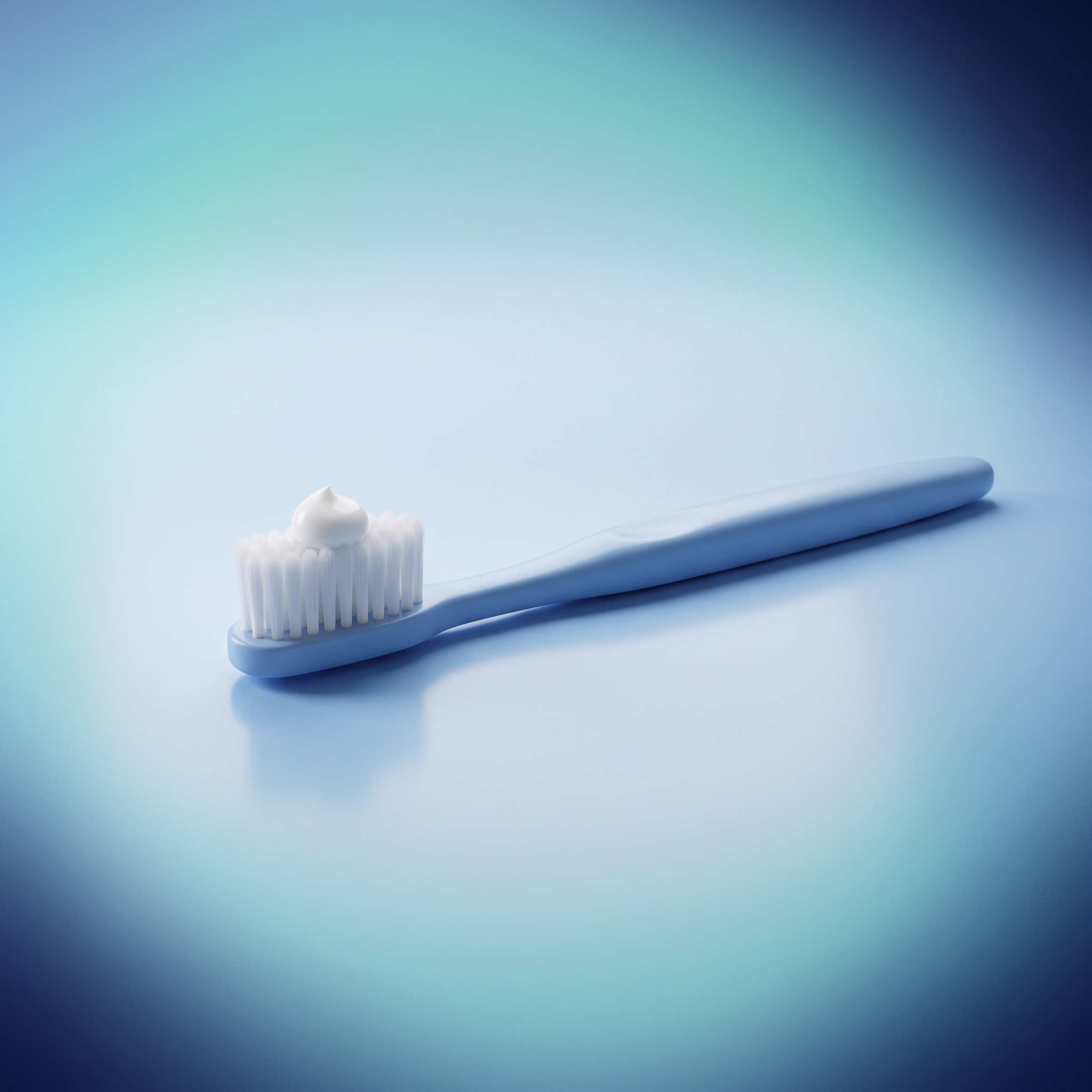 Brosse à dents souple avec une noisette de dentifrice de la taille d'un petit pois